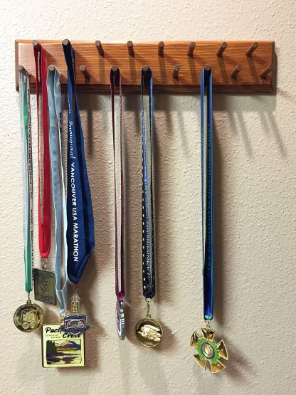 ActionCraftworks.com 17 peg, 18" wide, double row, bevelled edges, sports medals display rack, front