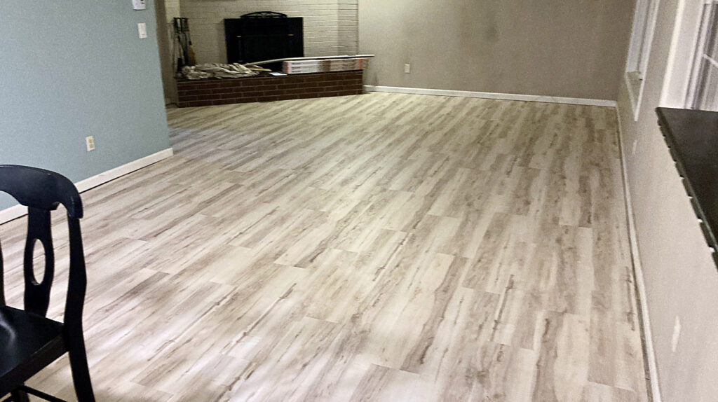Whole house flooring renovation: removed carpet and pad, installed LVP (waterproof Luxury Vinyl Planks) by Action Craftworks LLC in Vancouver WA