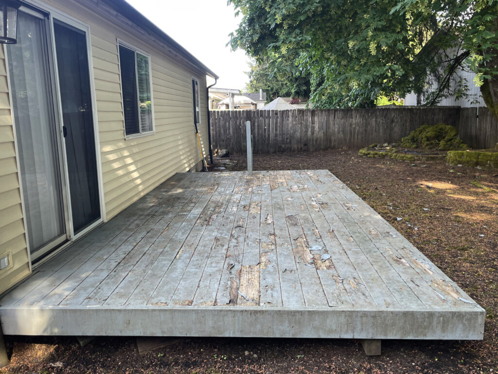 Before: weathered deck with peeling coating, left-end view, Action Craftworks LLC, Vancouver WA