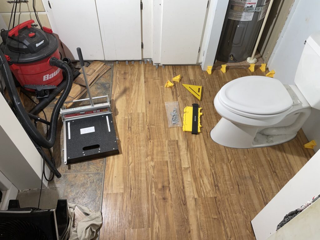 LVP flooring installation in bathroom by Action Craftworks LLC in LaCenter, WA