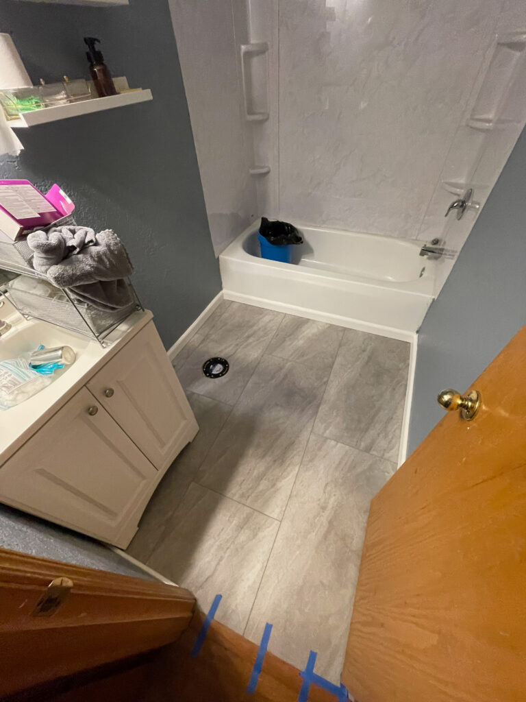 Bathroom remodel with new LVT/LVP flooring by Action Craftworks LLC in Vancouver, WA