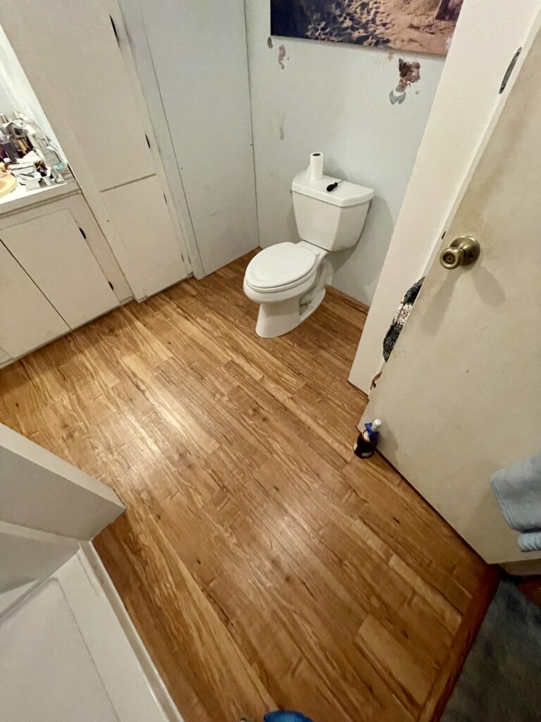 Bathroom renovation with shower and new vinyl plank flooring by Action Craftworks LLC in LaCenter, WA