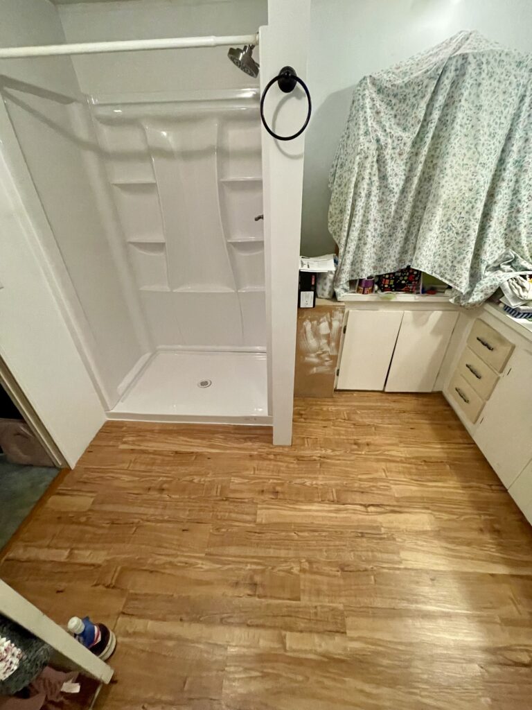 Shower replacement and new LVP flooring by Action Craftworks LLC in LaCenter, WA