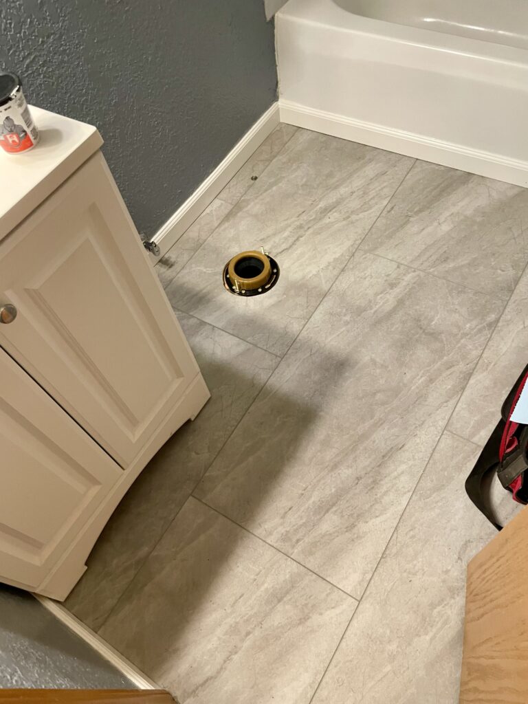 Bathroom remodel with new toilet wax ring by a subcontractor of Action Craftworks in Vancouver, WA