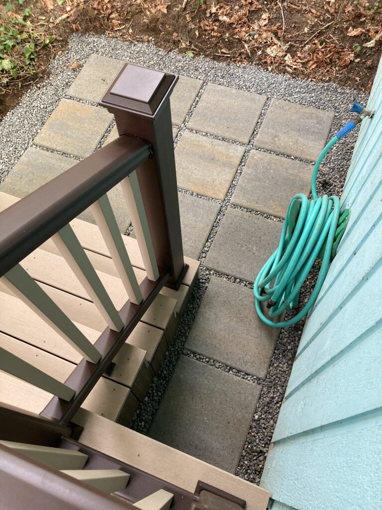 12" x 12" square concrete paver blocks landing for porch deck rebuild by Action Craftworks LLC in Vancouver, WA