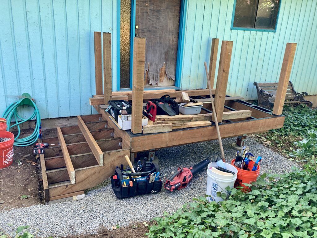 Pressure treated custom cut steps stringers for porch deck rebuild by Action Craftworks LLC in Vancouver, WA
