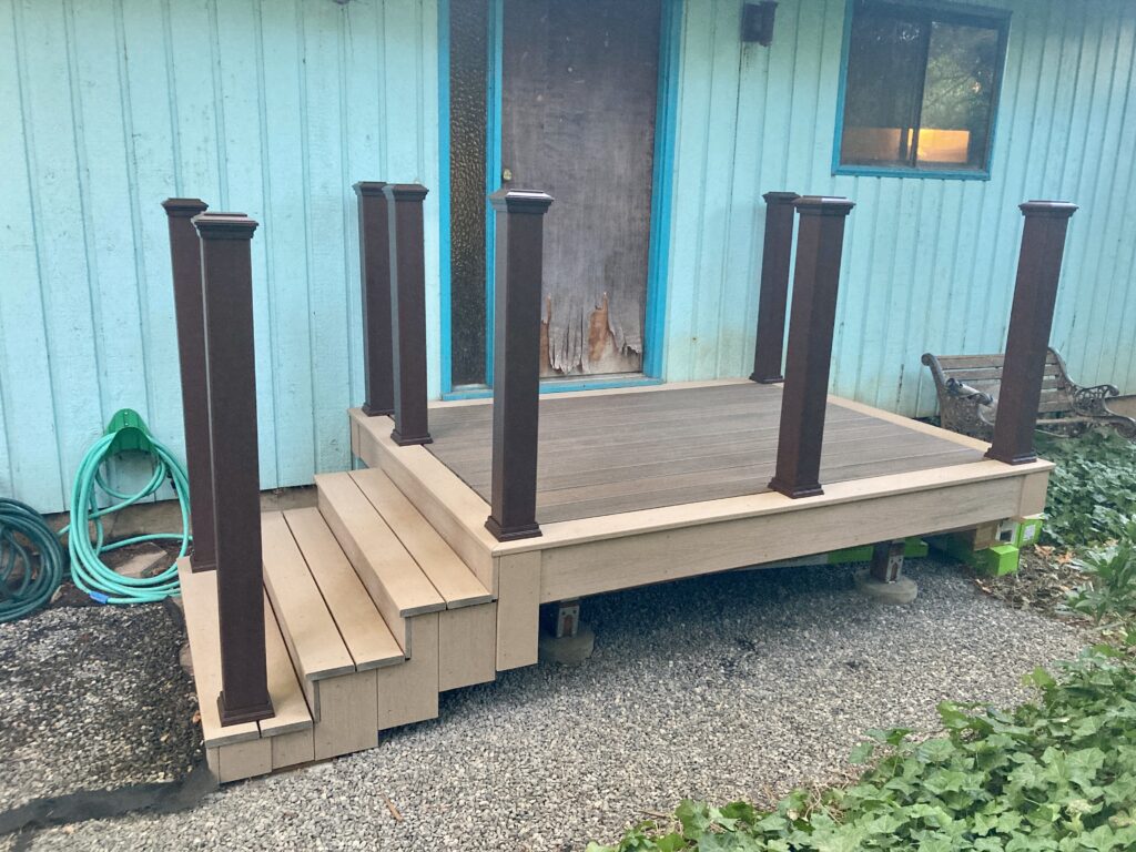 Trex post sleeves over 4x4 posts for porch deck rebuild by Action Craftworks LLC in Vancouver, WA