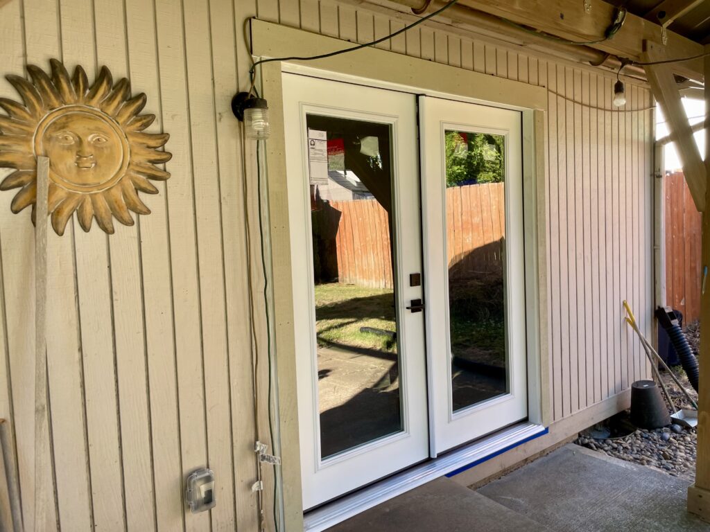 French doors replaced sliding glass doors at patio with Craftsman trim by Action Craftworks LLC in Vancouver WA, angle view