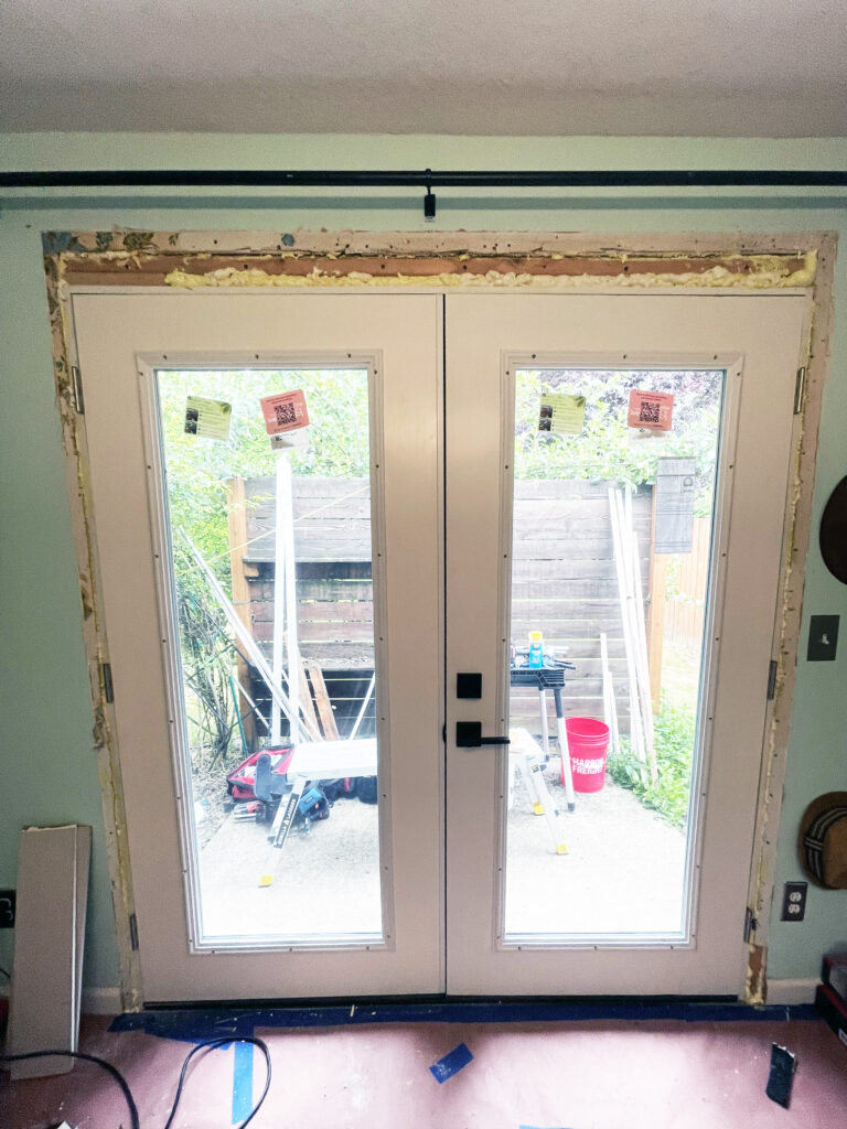 Foam insulation in gaps around French door installed by Action Craftworks LLC in Vancouver, WA