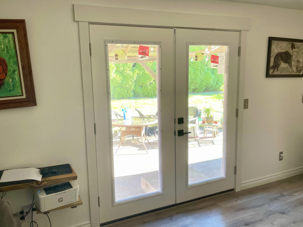 Interior Craftsman moulding and header on new French doors by Action Craftworks LLC in Vancouver WA