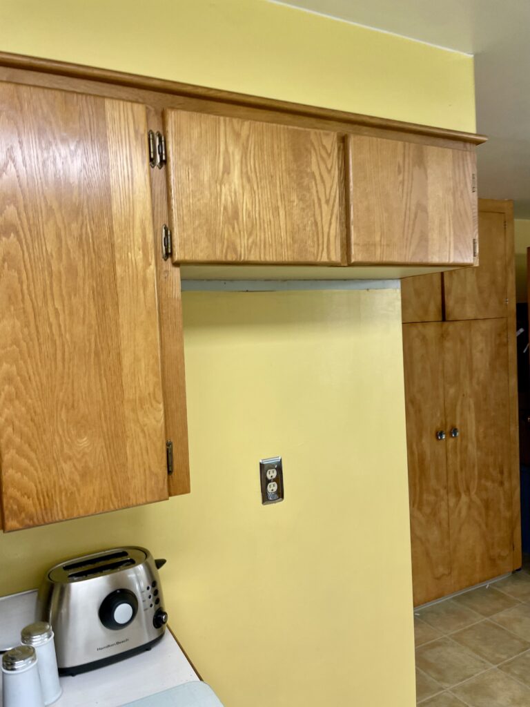 Kitchen cabinet renovation above refrigerator by Action Craftworks LLC in Vancouver, WA