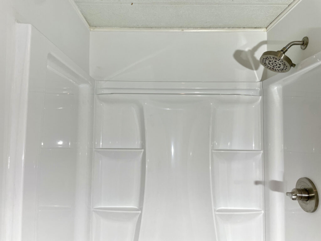 Top of shower wall patched and painted by Action Craftworks LLC in LaCenter, WA