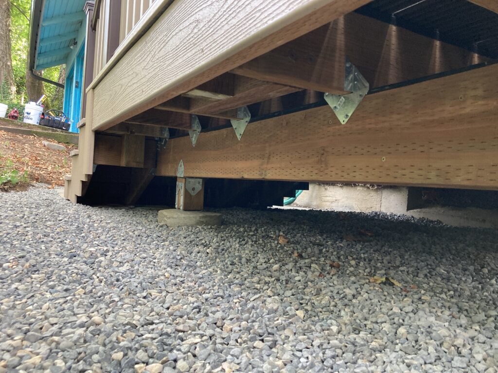 Simpson Strong-Tie brackets for framing of porch deck rebuild by Action Craftworks LLC in Vancouver, WA