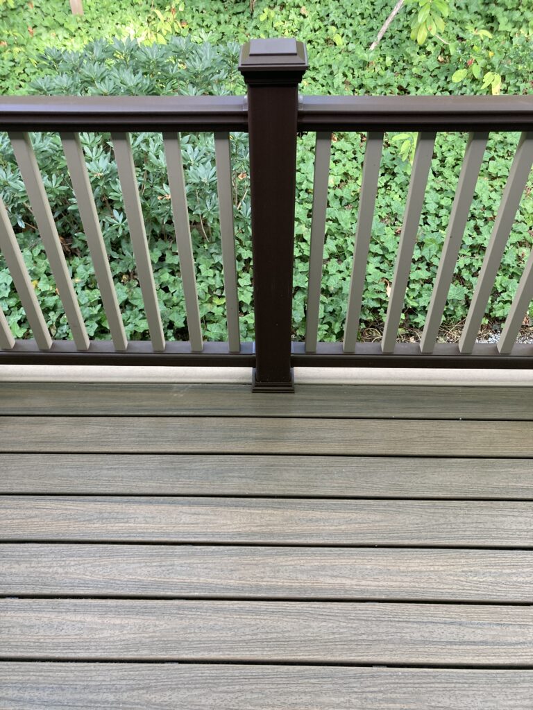 Trex composite post, cap, rails, balusters and decking for porch deck rebuild by Action Craftworks LLC in Vancouver, WA
