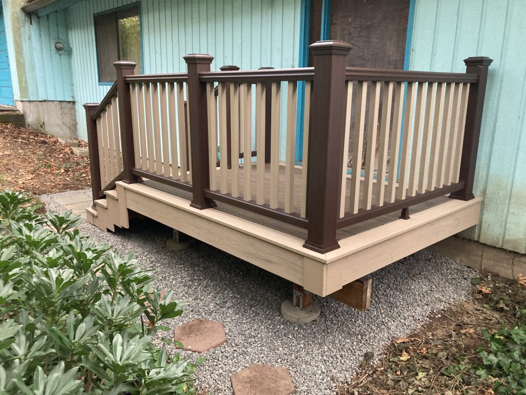 Trex composite porch deck with gravel base for rebuild by Action Craftworks LLC in Vancouver, WA