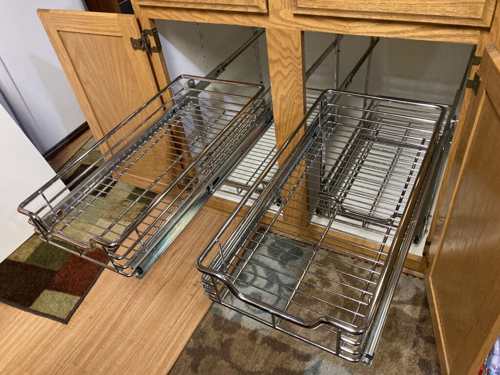 Kitchen renovation, pull out cabinet wire basket shelves by Action Craftworks LLC in Vancouver, WA