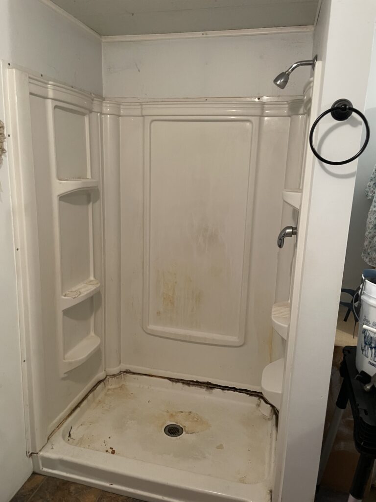 Existing cracked, settled and leaking shower in Lacenter, WA
